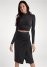 Venus Mock-Neck Crop Top in Black